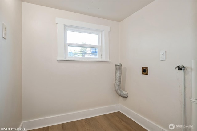 211 Yew St, Centralia, WA 98531 - washroom featuring laundry area, dark wood-style flooring, electric dryer hookup, baseboards, and hookup for a washing machine