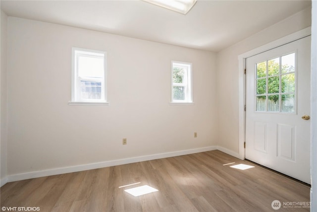 211 Yew St, Centralia, WA 98531 - interior space featuring baseboards, a healthy amount of sunlight, and light wood-style floors