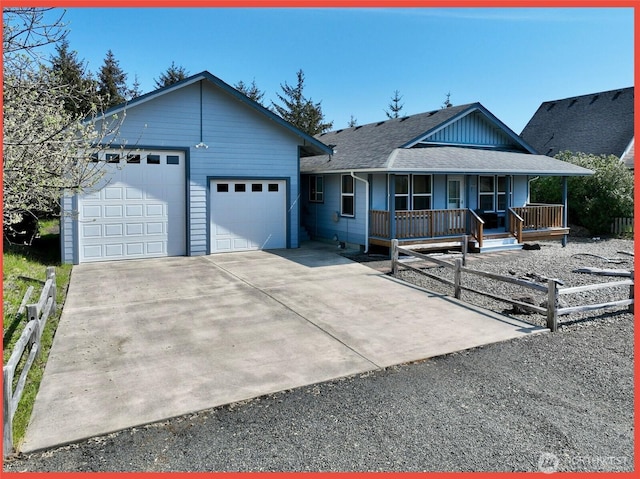 932 Wawona Ave SE, Ocean Shores, WA 98569 - view of front of house featuring a porch, driveway, a garage, roof with shingles, and fence