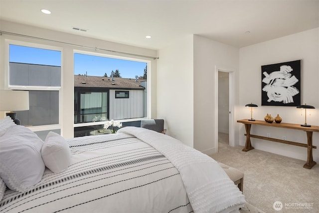 bedroom featuring visible vents, recessed lighting, carpet, and baseboards