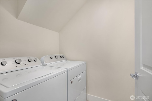 laundry room with laundry area and washer and clothes dryer