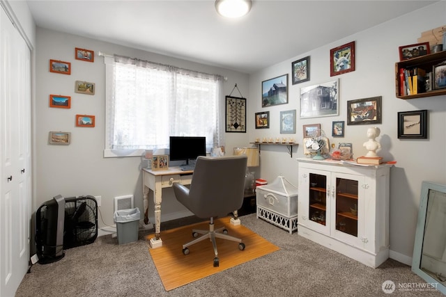 office featuring visible vents, carpet floors, and baseboards