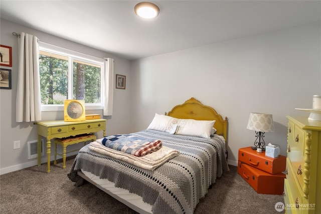 bedroom with visible vents, carpet, and baseboards