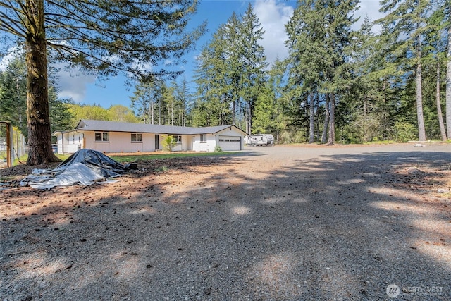 view of front of house featuring a garage and driveway