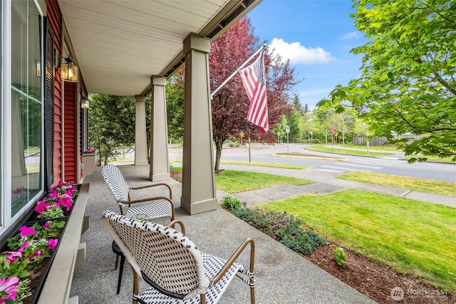 view of patio featuring a porch
