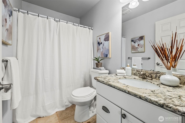 bathroom featuring toilet, tile patterned flooring, vanity, and a shower with curtain