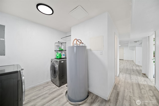 laundry room featuring laundry area, gas water heater, separate washer and dryer, baseboards, and light wood-type flooring