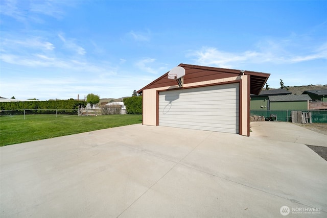 detached garage with fence
