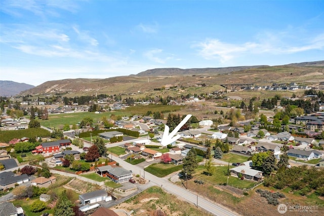 aerial view with a residential view and a mountain view