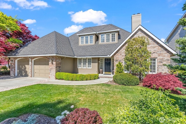 1208 N 20th Ave, Yakima, WA 98902 - view of front of home with a chimney, a shingled roof, a garage, driveway, and a front lawn