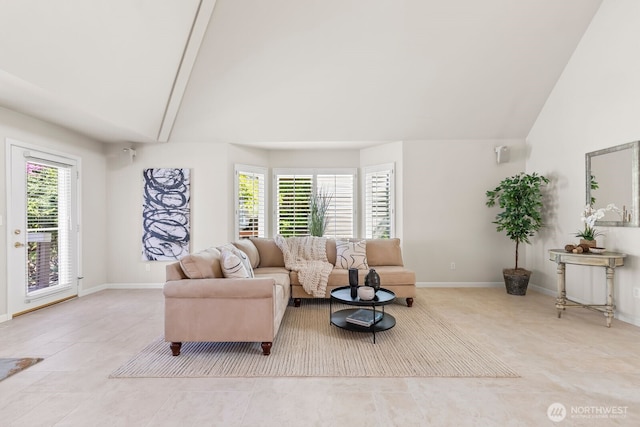 1208 N 20th Ave, Yakima, WA 98902 - living room with baseboards, vaulted ceiling with beams, and a wealth of natural light