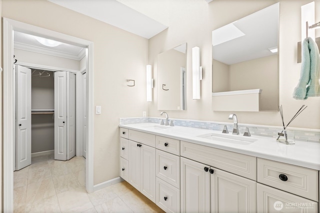 1208 N 20th Ave, Yakima, WA 98902 - bathroom with baseboards, marble finish floor, double vanity, and a sink