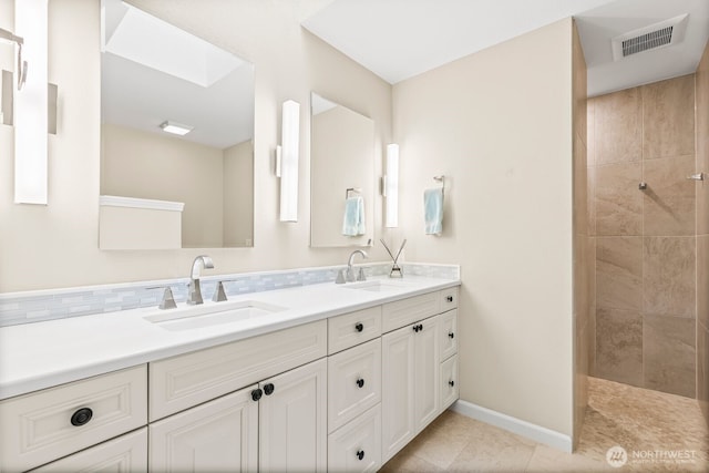 1208 N 20th Ave, Yakima, WA 98902 - full bathroom featuring visible vents, walk in shower, double vanity, and a sink