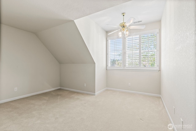 1208 N 20th Ave, Yakima, WA 98902 - additional living space with light colored carpet, visible vents, a ceiling fan, and baseboards
