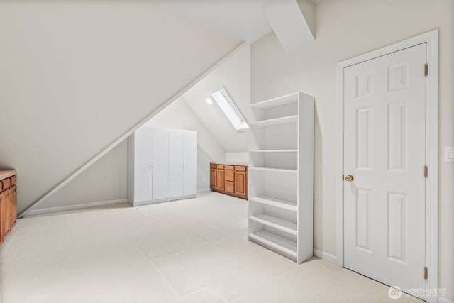 1208 N 20th Ave, Yakima, WA 98902 - additional living space with light colored carpet, baseboards, and lofted ceiling with skylight