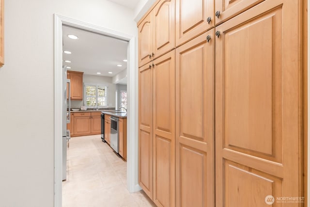 1208 N 20th Ave, Yakima, WA 98902 - corridor featuring light tile patterned floors, recessed lighting, and a sink