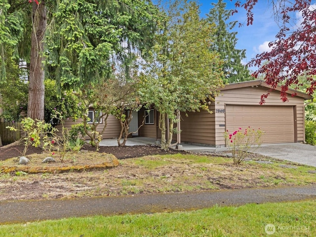 2909 SW 116th St, Burien, WA 98146 - view of front facade featuring asphalt driveway and an attached garage