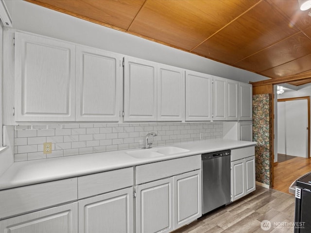 2909 SW 116th St, Burien, WA 98146 - kitchen featuring stainless steel dishwasher, a sink, wooden ceiling, white cabinetry, and light countertops