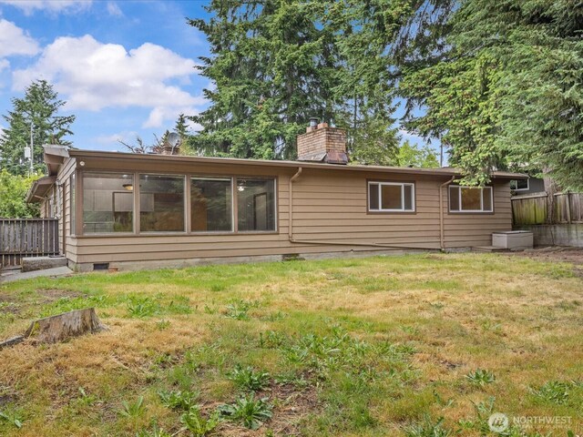 2909 SW 116th St, Burien, WA 98146 - rear view of property with a chimney and crawl space
