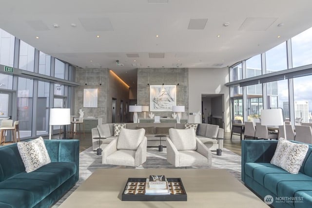 121 Stewart St Unit 905, Seattle, WA 98121 - common area featuring a high ceiling, expansive windows, and recessed lighting