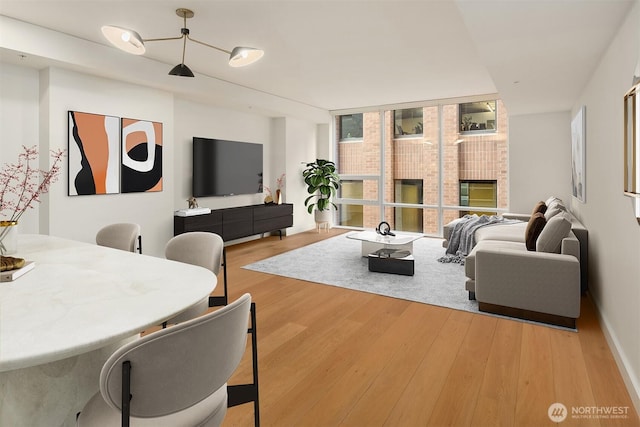 121 Stewart St Unit 905, Seattle, WA 98121 - living area with wood finished floors
