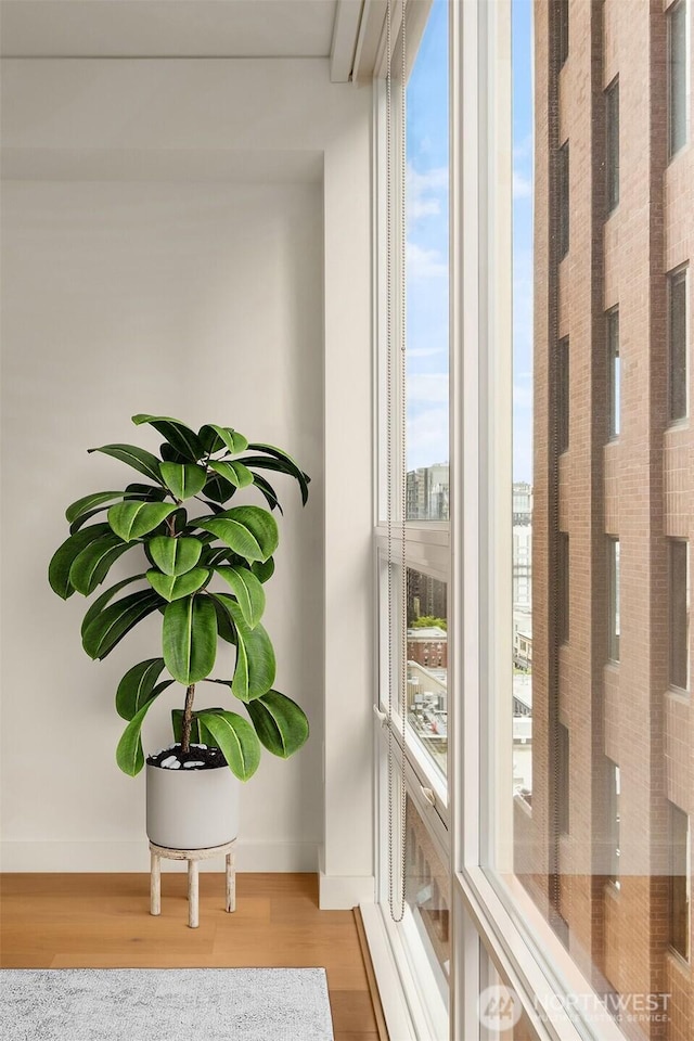121 Stewart St Unit 905, Seattle, WA 98121 - detailed view of wood finished floors and baseboards