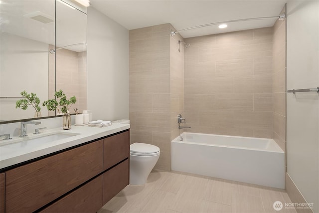 121 Stewart St Unit 905, Seattle, WA 98121 - full bathroom with toilet, vanity, and shower / washtub combination