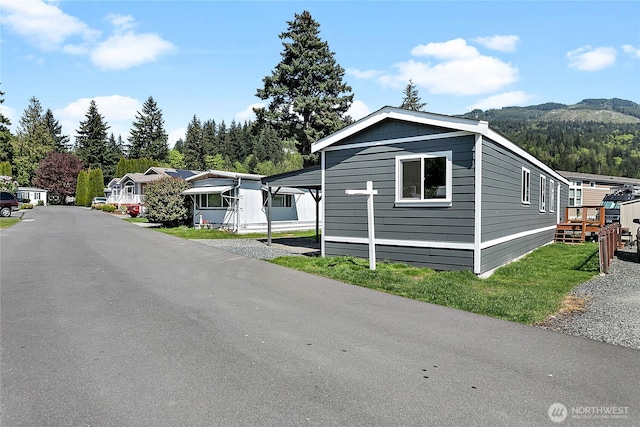 view of front of home with a mountain view