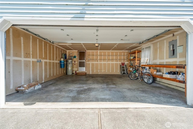 garage featuring a garage door opener and electric panel