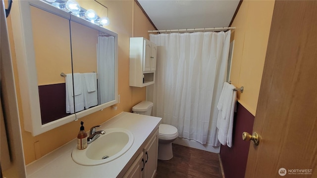 151 W Nikula Rd, Winlock, WA 98596 - full bath with shower / bathtub combination with curtain, wood finished floors, toilet, and vanity