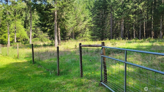 151 W Nikula Rd, Winlock, WA 98596 - view of yard featuring fence and a forest view