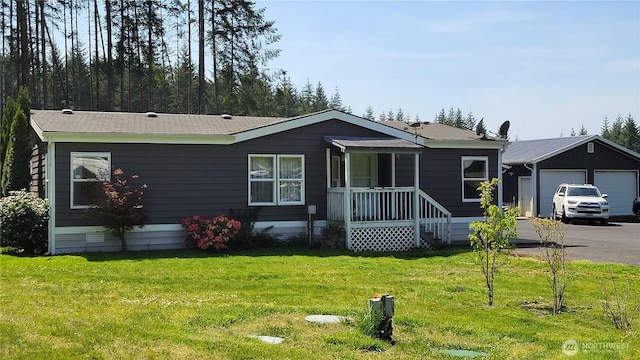 151 W Nikula Rd, Winlock, WA 98596 - view of front of home featuring a front yard, driveway, and an attached garage