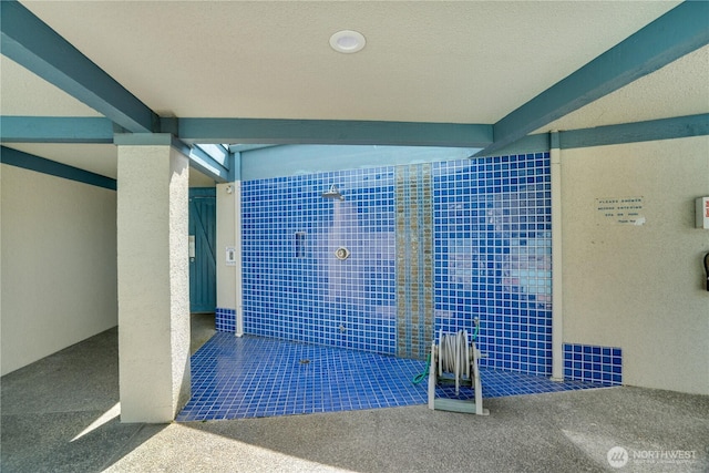 bathroom with beamed ceiling