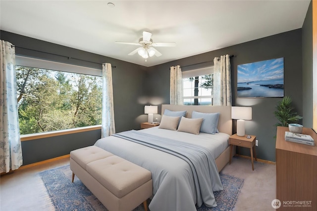 bedroom with baseboards and ceiling fan