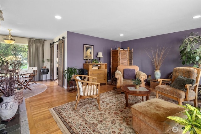 330 15th St, Snohomish, WA 98290 - sitting room featuring a barn door, light wood-style floors, recessed lighting, and baseboards