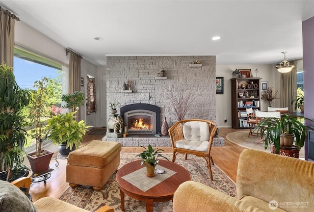 330 15th St, Snohomish, WA 98290 - living room featuring wood finished floors, a stone fireplace, and recessed lighting