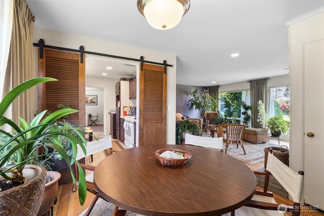 330 15th St, Snohomish, WA 98290 - dining space featuring a barn door, light wood-style floors, and recessed lighting