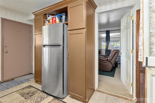 330 15th St, Snohomish, WA 98290 - kitchen with freestanding refrigerator, light tile patterned floors, and light carpet