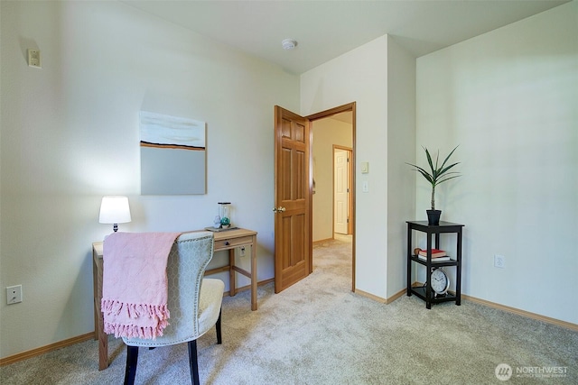 living area with carpet and baseboards