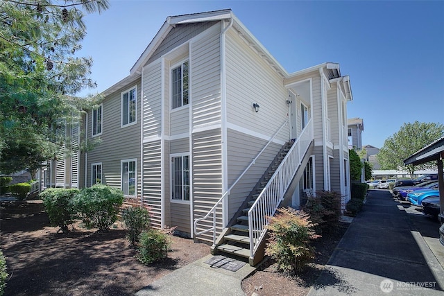 view of property exterior with stairs