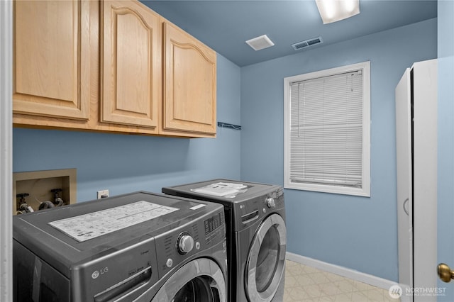 laundry room with cabinet space, independent washer and dryer, visible vents, baseboards, and light floors