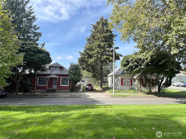 exterior space with a front yard