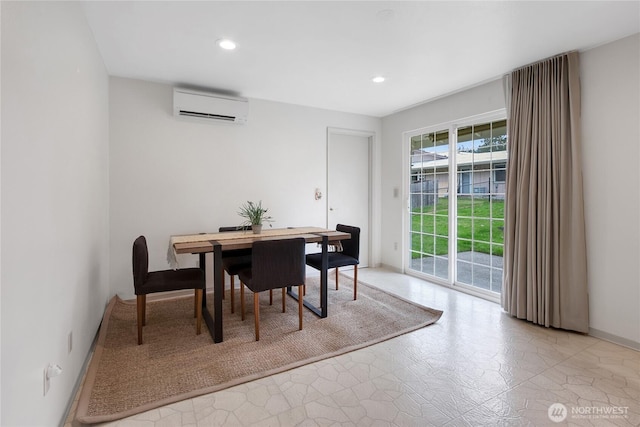 dining room with a wall unit AC and recessed lighting