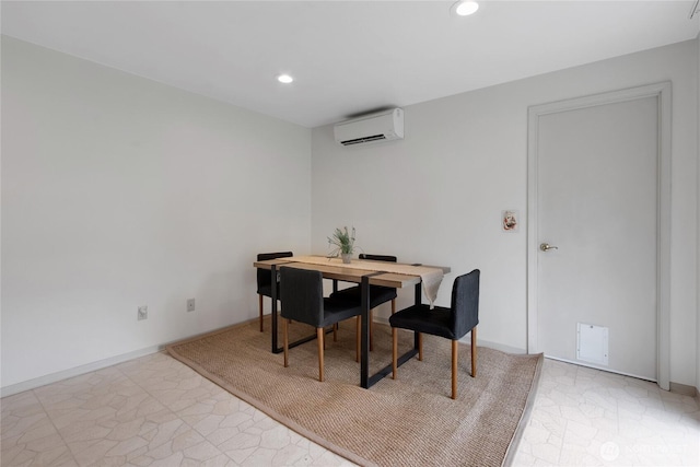 dining space with recessed lighting, baseboards, and a wall unit AC