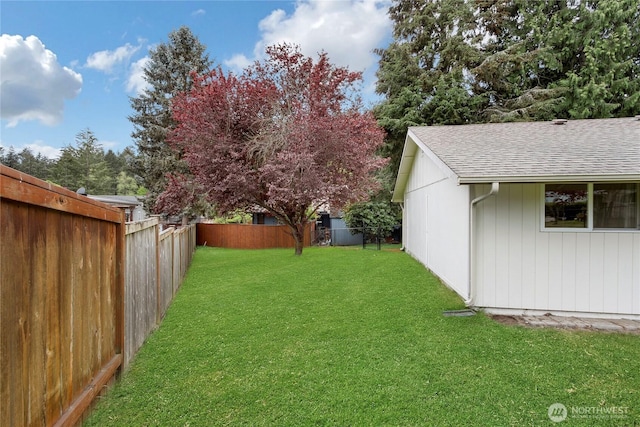 view of yard featuring a fenced backyard