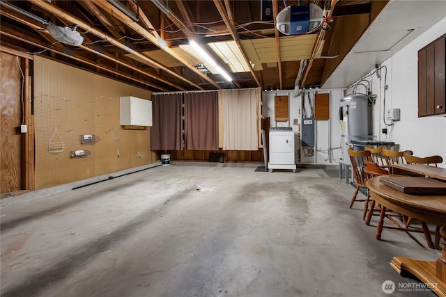 basement with washer / clothes dryer and water heater