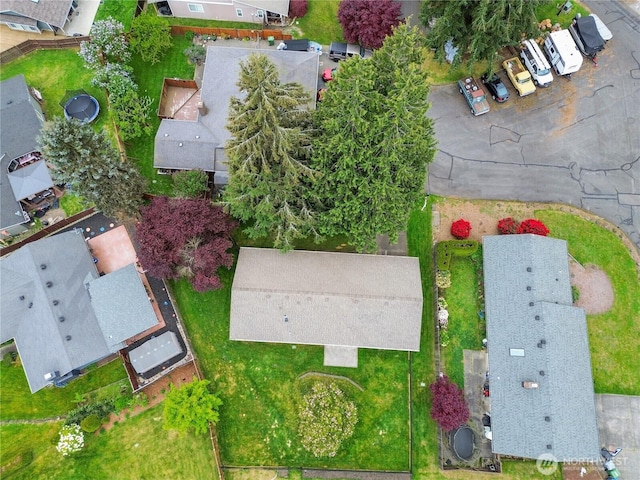 birds eye view of property with a residential view