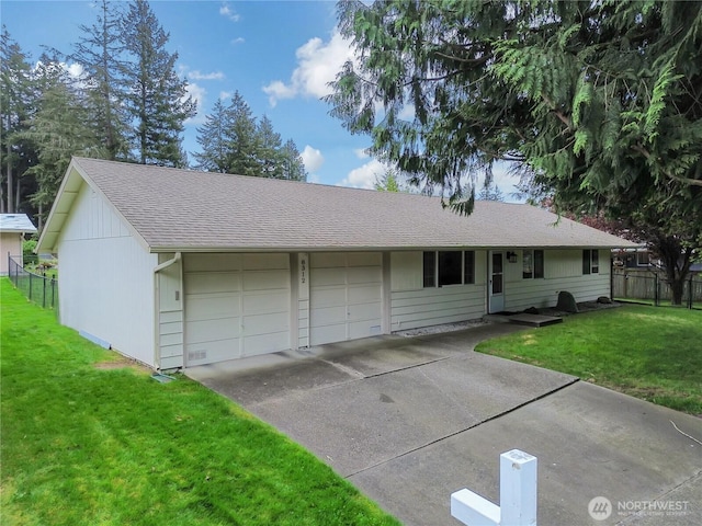 ranch-style home with a shingled roof, fence, and a front yard