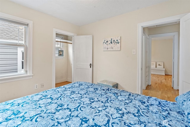 bedroom featuring wood finished floors