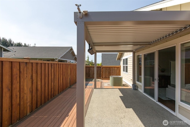 wooden deck featuring fence and central air condition unit